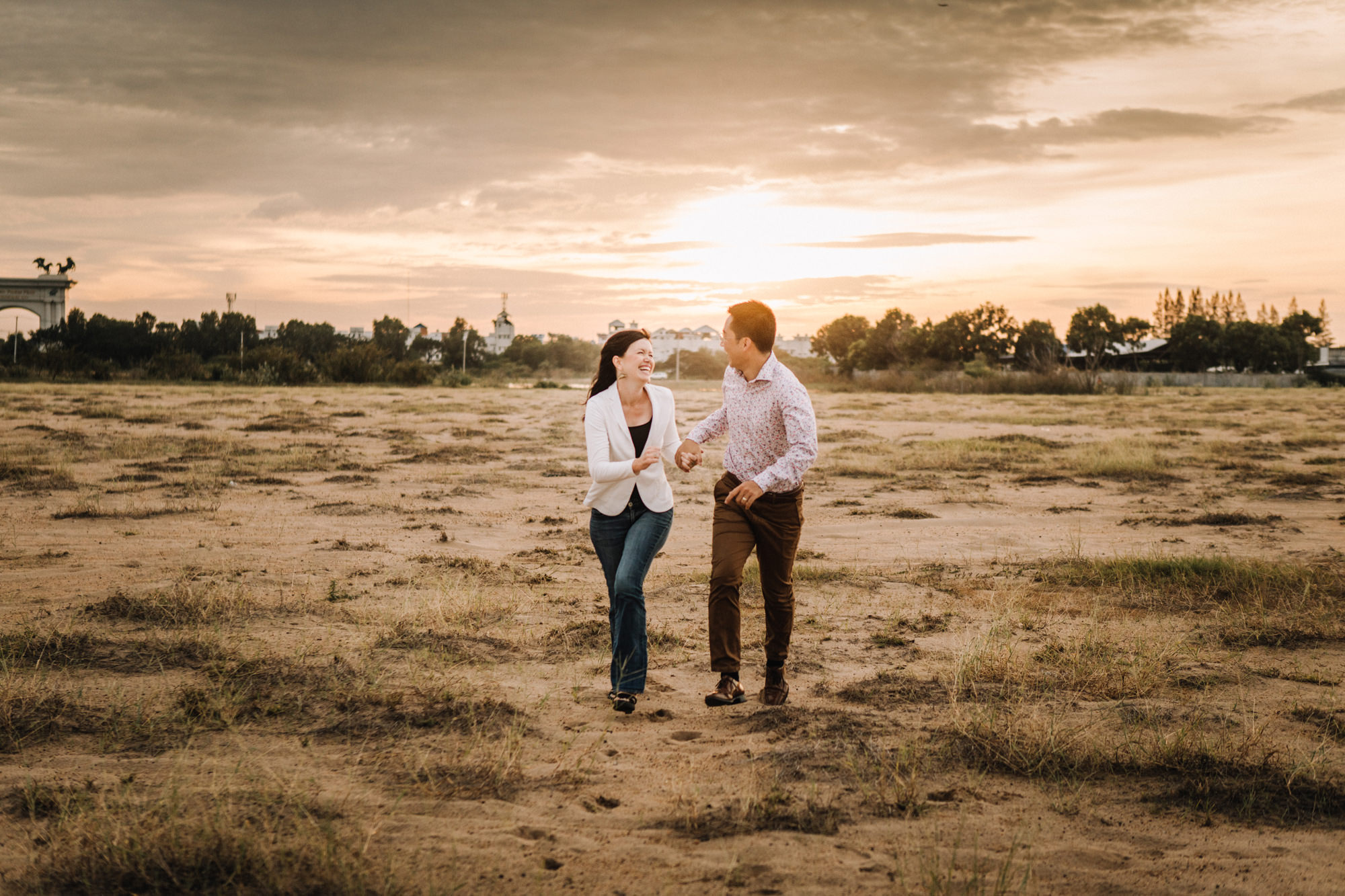 couple running near royal Phnom epnh gold course