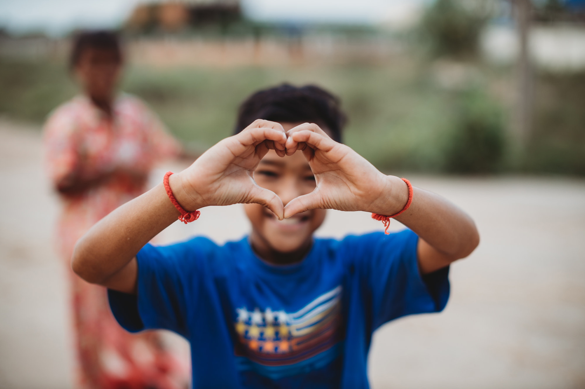 cambodian kid phnom penh love heart